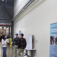 Three students discussing a project.